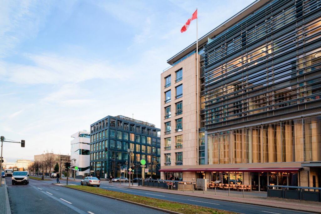 street with modern building with canadian flag on potsdamer platz